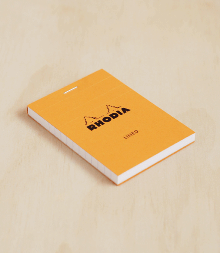 Rhodia A7 N#11 Top Stapled Ruled Orange Travers - Pencraft the boutique
